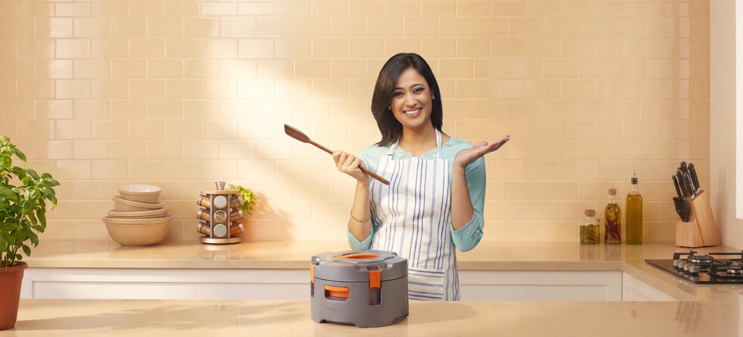 Woman with insulated lunch box keeping food hot for 12 hours